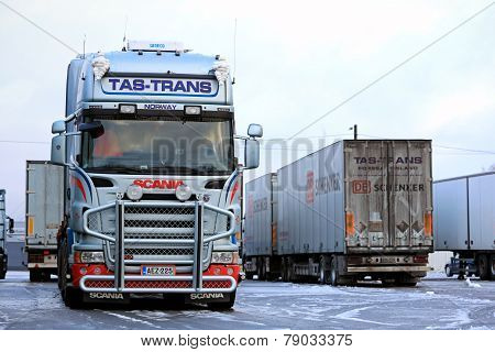 Fleet Of Scania Trailer Trucks On Icy Yard