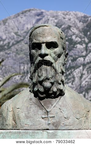 PRCANJ, MONTENEGRO - JUNE, 08: Statue of Andrija Zmajevic infront The Catholic Church of the Birth of the Virgin Mary, on June 08, 2012, in Prcanj, Montenegro