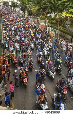BANGKOK, THAILAND - DEC 5, 2014: Motorcycle traffic jam in city centre during celebrate football fans winning AFF Suzuki Cup 2014. Goals gave them a dramatic 4-3 aggregate victory over Malaysia. 