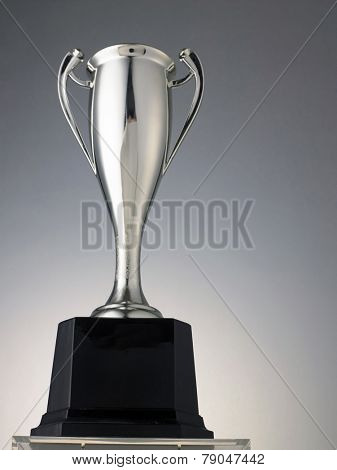 low angle of tall silver trophy