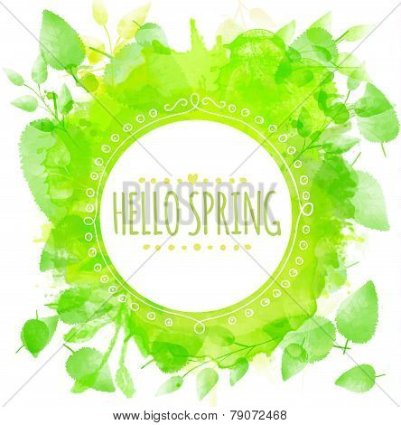 Hand drawn round frame text hello spring. Green watercolor splash texture with printed leaves. Artis