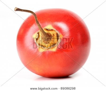Close up of tamarillo on white background