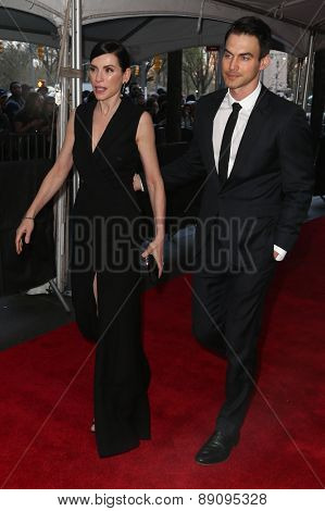 NEW YORK-APR 21: Actress Julianna Margulies (L) and husband Keith Lieberthal attend the 2015 Time 100 Gala at Frederick P. Rose Hall, Jazz at Lincoln Center on April 21, 2015 in New York City.