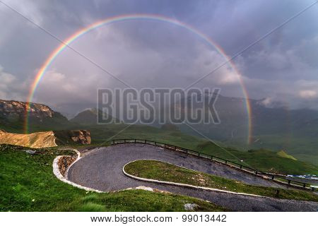 Amazing rainbow on the top of grossglockner pass, Alps, Switzerland, Europe.