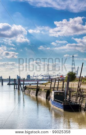 View on the busy port of Antwerp, seen from the little old port of Lillo village