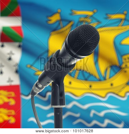 Microphone On Stand With National Flag On Background - Saint-pierre And Miquelon