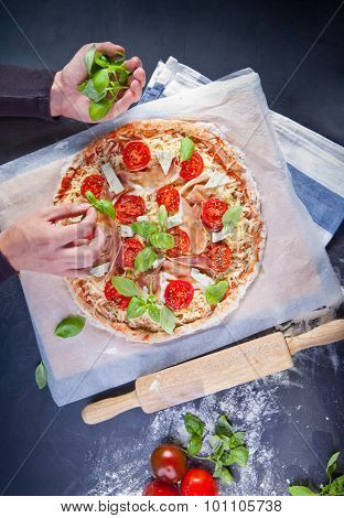 Homemade pizza. The dough with the addition of fiber and Provencal herbs