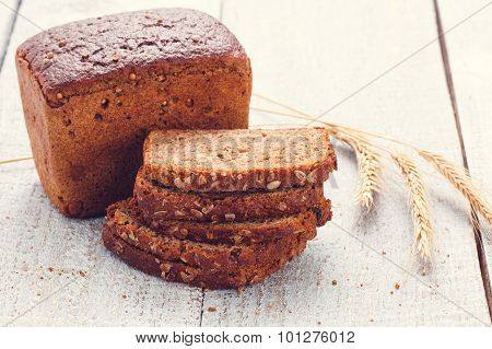 Bread With Spikelet Of Wheat On A  White Boards