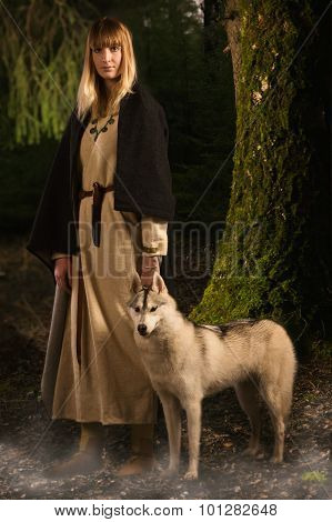 Slavonian Girl And Siberian Husky In The Deep Forest