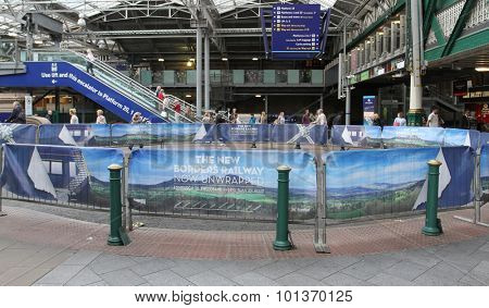 EDINBURGH, SCOTLAND - SEPTEMBER 11: Advertising banners for recently opened Borders Railway on inside Waverley Station September 11, 2015 Edinburgh, Scotland