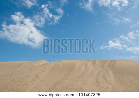 Blue sky over dune in the desert