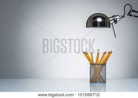 Lighting Up Orange Pencil Holder Stationery With Desk Lamp