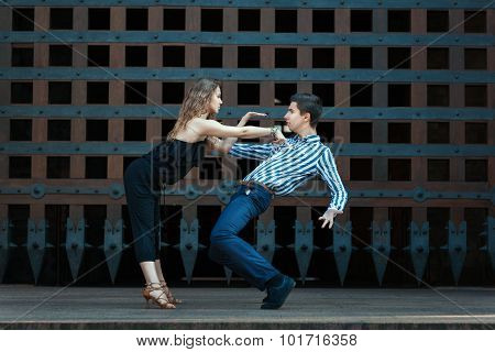 Young Couple Dancing The Dance.