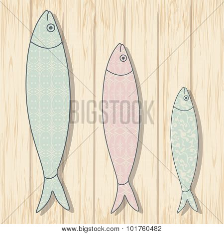 Traditional Portuguese Icon. Colored Sardines With Geometric Chevron Patterns On Wooden Background.