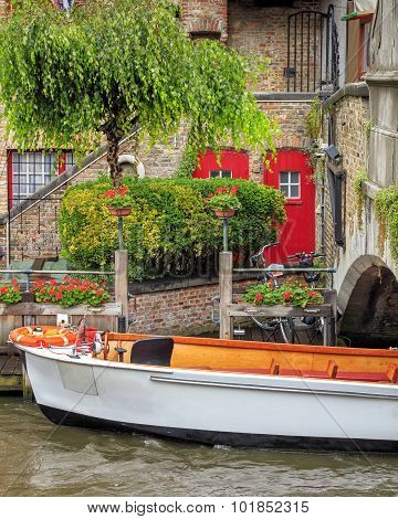 Boat on the waters of Bruges, Belgium