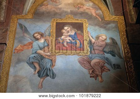 LJUBLJANA, SLOVENIA - JUNE 30: Virgin Mary with baby Jesus, fresco in the Franciscan Church of the Annunciation on Preseren Square in Ljubljana, Slovenia on June 30, 2015