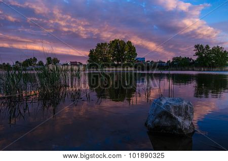 Sunset over calm lake