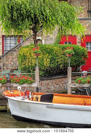 Boat on the waters of Bruges, Belgium