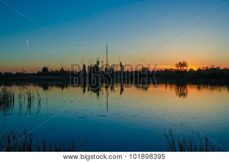 Sunset over calm lake