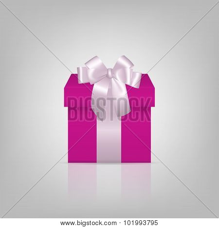Pink square gift box with white ribbon and bow