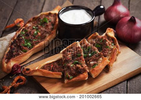 Turkish pide, meat and pastry street food similar to pizza