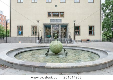 STOCKHOLM, SWEDEN - JULY 4, 2017: The Eastman institute and the Eastman fountain in Stockholm.  The institute was donated by George Eastman to provide free dental care to children.
