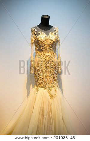 Wedding dress gown on mannequin in bridal gown. Bride's morning wedding preparation concept
