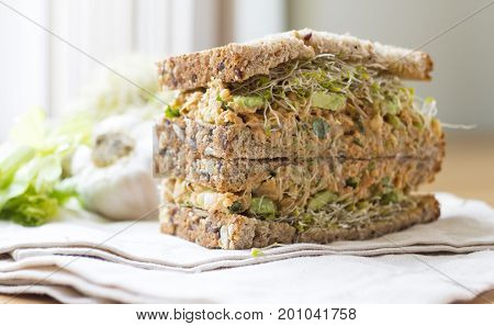 Chickpea Sandwiches with garlic sauce and avocado