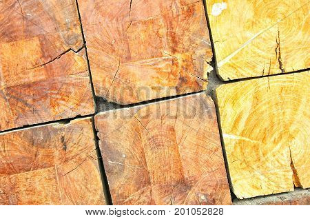 Natural wooden background. Closeup of chopped firewood. Pile of wood logs.