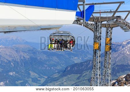 Mt. Titlis Switzerland - May 28 2017: Skier sitting at 