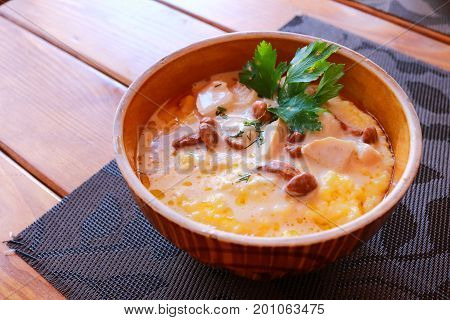 Banosh - Ukrainian Hutsul meal - maize porridge - with bacon, cracklings and cheese.