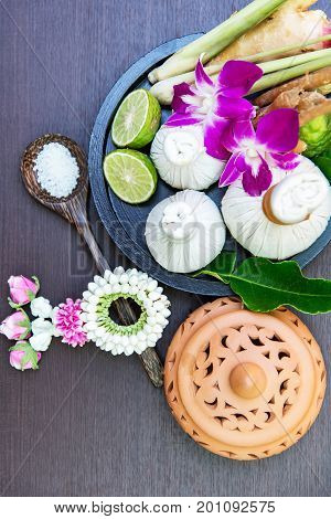 Spa massage compress balls herbal ball on the wooden with treaments spa Thailand select focus