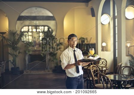 Waiter at the hotel bar