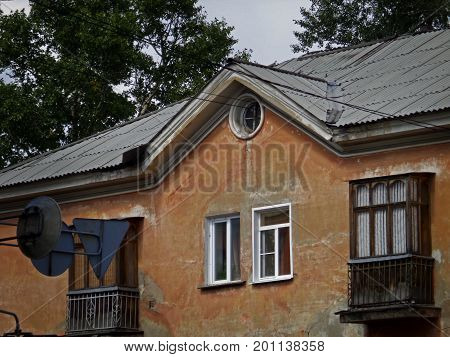 Kazakhstan, Ust-Kamenogorsk - 01, August 2017. A fragment of an old building on Gogol street.Architecture. Old architecture. Old building. Architectural background.