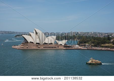 SYDNEY,NSW,AUSTRALIA-NOVEMBER 20,2016: Sydney Opera House at Bennelong Point with nautical vessels in Sydney, Australia