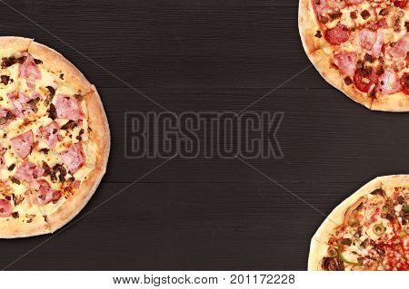 Pizza on wooden table top view. Fast food Delicious. Post blog social media. View from above with copy space. Banner template layout mockup top view on pizza. Pizza ready to eat.