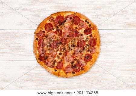 Pizza on wooden table top view. Fast food Delicious. Post blog social media. View from above with copy space. Banner template layout mockup top view on pizza. Pizza ready to eat.