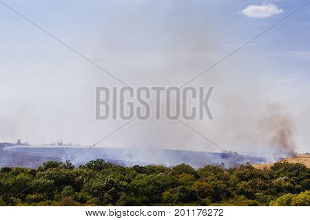 Natural summer fires caused by heat, copy space