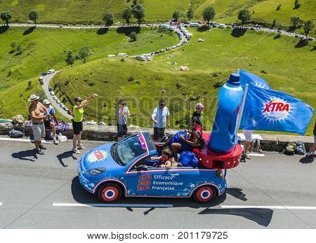 Col de PeyresourdeFrance- July 23 2014: X-tra vehicle during the passing of the Publicity Caravan on the road to Col de Peyresourde in Pyrenees Mountains in the stage 17 of Le Tour de France on 23 July 2014.