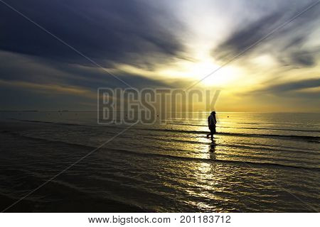 The beach Thung Wua Lan Beach idyllic with silhouette morning at Chumphon Province Thailand is famous for travel