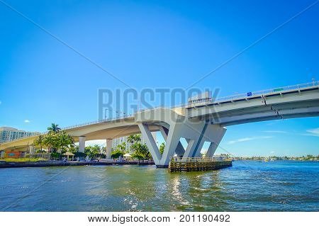 FORT LAUDERDALE, USA - JULY 11, 2017: Nice view of an opened draw bridge raised to let ship pass through at harbor in Fort Lauderdale, Florida.