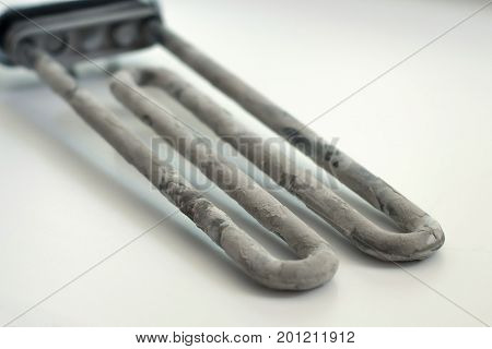 Washing machine heater on a white background