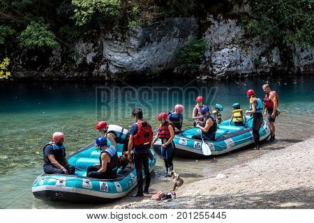 Adventure Team Doing Rafting Of The Voidomatis River In Zagori