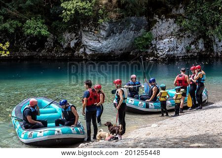 Adventure Team Doing Rafting Of The Voidomatis River In Zagori