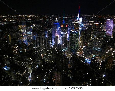 Aerial view of New York City skyline at night