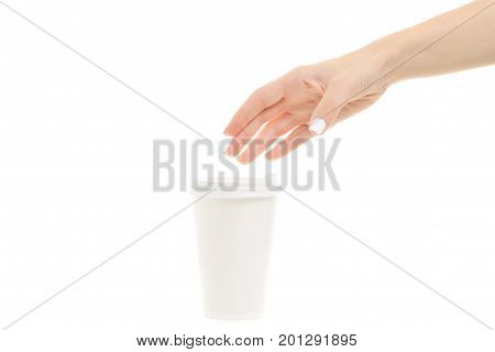 Female hands holding coffee in a cardboard glass on a white background isolation