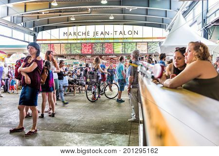 Montreal, Canada - May 28, 2017: Jean Talon Market Sign And Entrance With People In Little Italy Nei