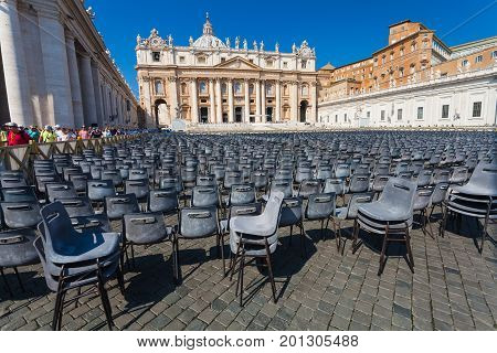 VATICAN CITY VATICAN - September 13 2016: A lot of chairs are on the St. Peter's Basilica (Basilica Papale di San Pietro in Vaticano)