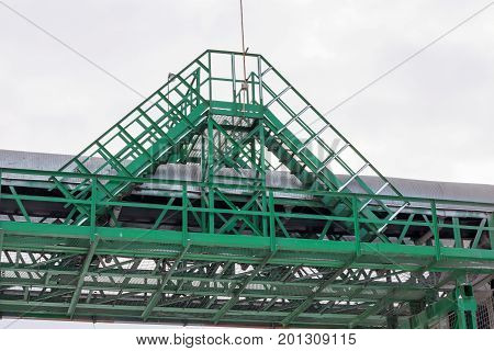 Fragment Metal Grain Elevator In Agricultural Zone. Agricultural Silos. Building Exterior. Storage A