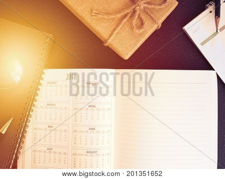blank planning notebook and pen on desk use us organizer schedule life or business planner concept.